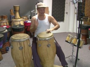 how to play congas- michael pluznick